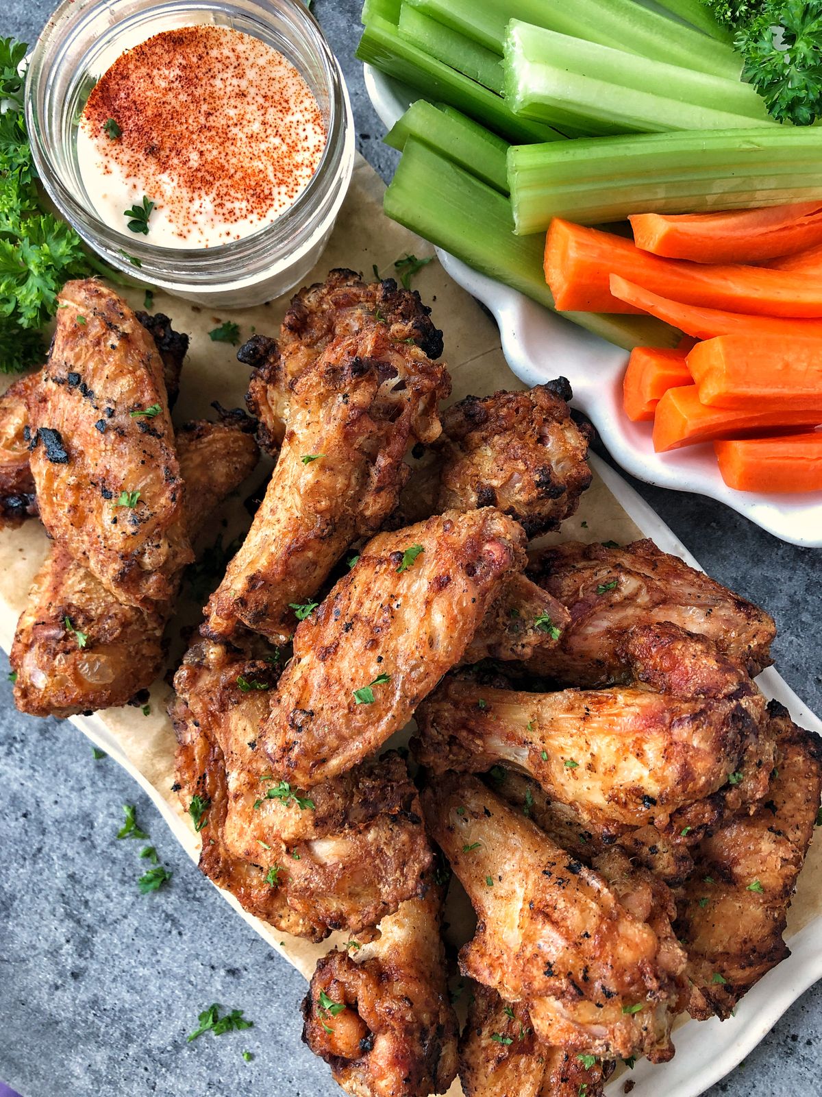 Corn starch in this chicken wing recipe absorbs excess moisture while locking in flavor.  (Audrey Alfaro/For The Spokesman-Review)