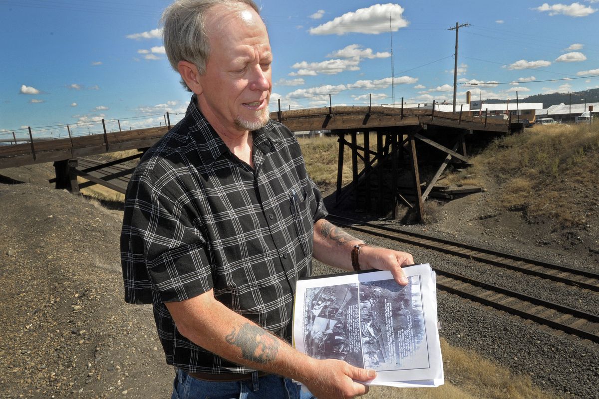 Blaine Burrell believes from his research that aerial showman Cromwell Dixon crashed his plane in 1911 just east of downtown Spokane, near the area where Burrell stands. Burrell would like to see a memorial erected in honor of Dixon.  (Christopher Anderson)