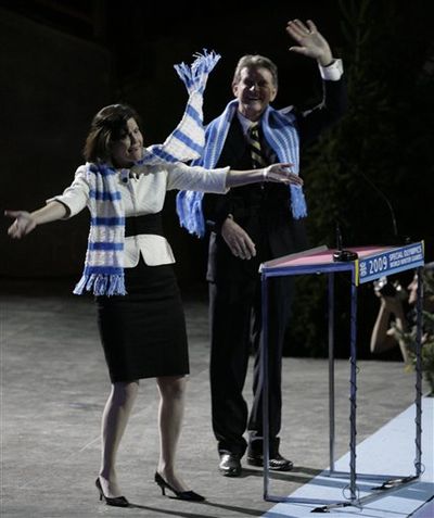 Idaho First Lady Lori Otter, left, and Gov. Butch Otter, right, encourage the crowd at the opening ceremonies for the Idaho Special Olympics on Saturday. It was Gov. Otter's first public appearance after undergoing shoulder surgery last Monday; he returned to work part-time today, 2/9/09  (AP Photo / The Associated Press)