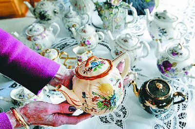 
Donna Young holds a teapot given to her mother as a birthday gift. 
 (Jed Conklin / The Spokesman-Review)