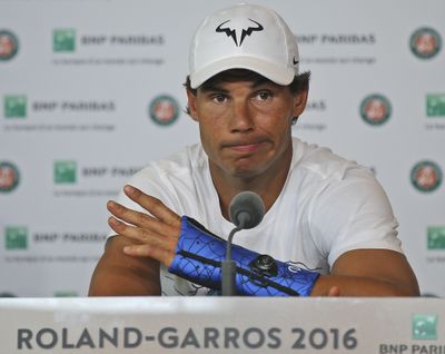 FILE - Nine-time champion Rafael Nadal announced in May that he was pulling out of the French Open because of an injury to his left wrist during a press conference at the Roland Garros stadium in Paris. Nadal will return to play an exhibition in United Arab Emirates. (Michel Euler / Associated Press)