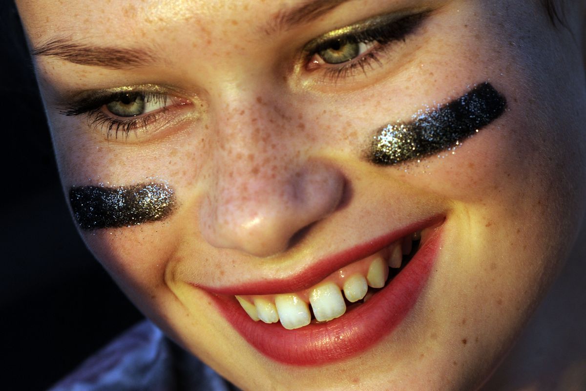 Post Falls High School 11th-grader Mariah Rouse is all smiles before the annual powder puff football game on Tuesday. 