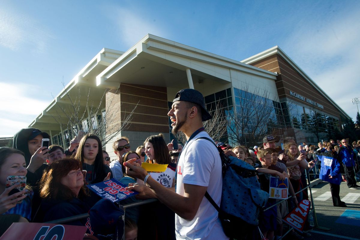 Gonzaga’s Nigel Williams-Goss signs autographs for fans during a homecoming welcome for the Gonzaga basketball team on Tuesday, April 4, 2017, at McCarthey Athletic Center in Spokane. (Tyler Tjomsland / The Spokesman-Review)