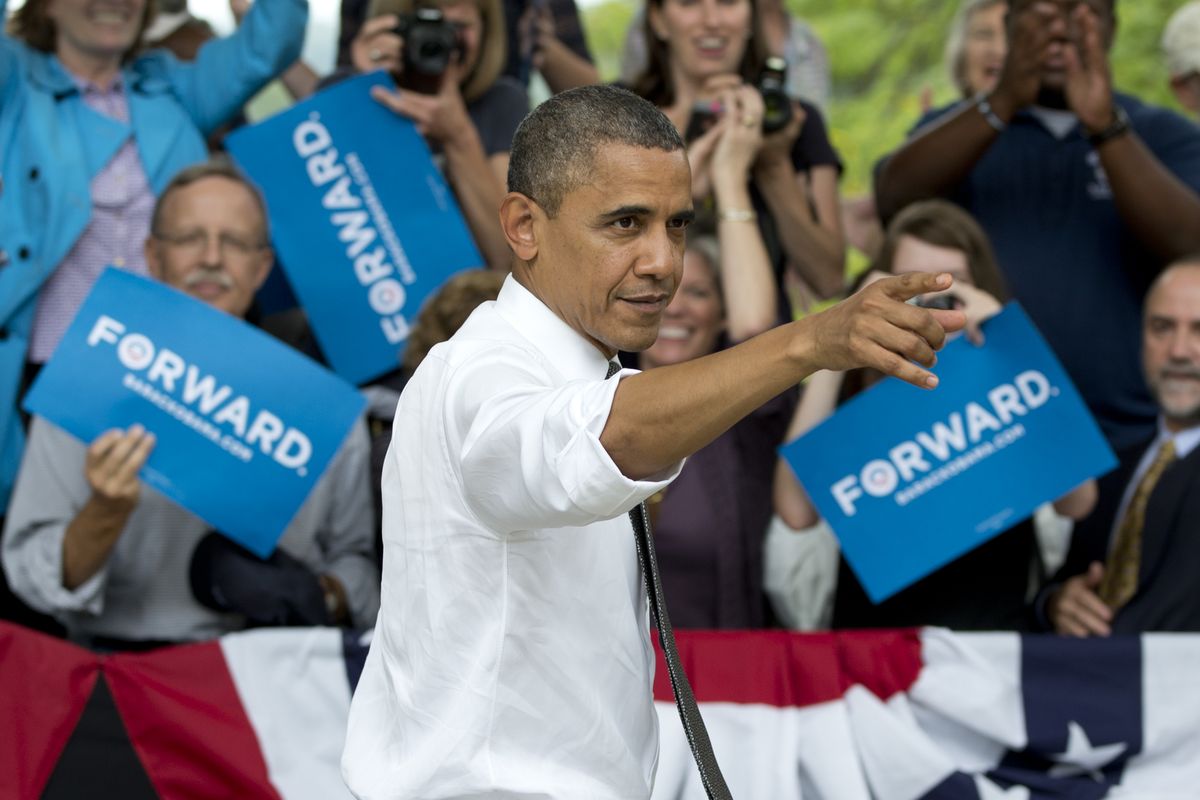 President Barack Obama points to the crowd as he leaves a campaign event at Eden Park�s Seasongood Pavilion, Monday, Sept. 17, 2012, in Cincinnati, Ohio. (Carolyn Kaster / Associated Press)