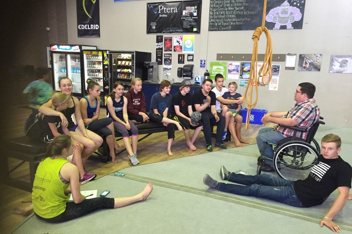 Josh Jackman, right, addresses youth climbers in the Spokane Climbing Association. (Josh Jackman / Courtesy)