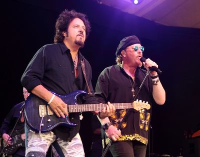 Steve Lukather, left, and Joseph Williams of the band Toto perform in concert last month in Baltimore. The band lands at Northern Quest Resort and Casino on Friday. (Associated Press)