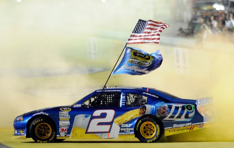 Brad Keselowski, driver of the #2 Miller Lite Dodge, celebrates with a burnout after winning the series championship and finishing in fifteenth place for the NASCAR Sprint Cup Series Ford EcoBoost 400 at Homestead-Miami Speedway on November 18, 2012 in Homestead, Florida. (Photo Credit: John Harrelson/Getty Images for NASCAR) (John Harrelson / Getty Images North America)