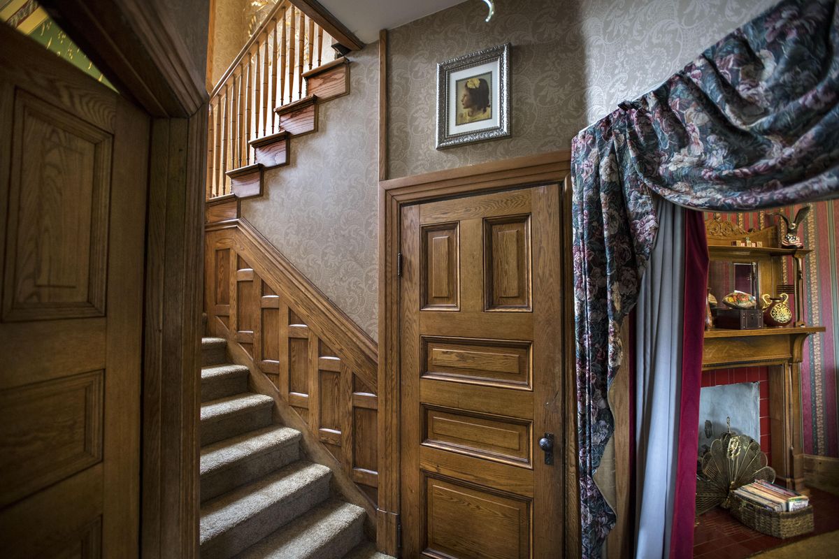 The staircase leading to the second floor of the Patrick S. Byrne home features original woodwork. (Dan Pelle / The Spokesman-Review)