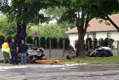 A woman suspected of stealing a car was killed when the vehicle crashed before dawn Friday. A man allegedly involved in the theft was arrested Friday night, the Spokane County Sheriff’s Office said.  (Mike  Prager / The Spokesman-Review)