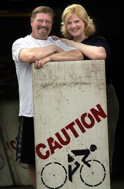
Larry and Melissa Halverson pose with equipment for the 12th annual Loreen Miller Bike Ride, which starts at Mt. Spokane High School on Sunday morning. 
 (Brian Plonka / The Spokesman-Review)