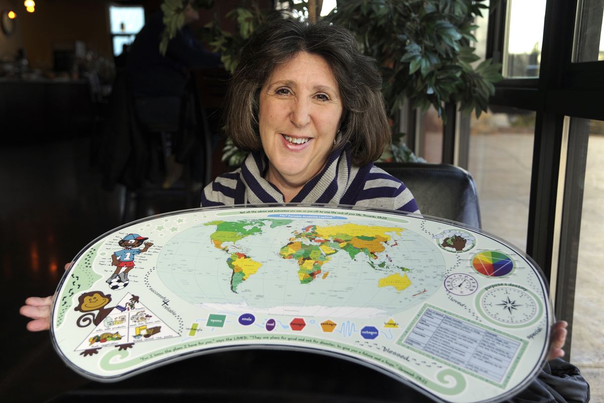 Jackie Wells developed the Portable Academic LapDesk for schoolchildren in Malawi. The desks will be produced in Coeur d'Alene. (Colin Mulvany / The Spokesman-Review)