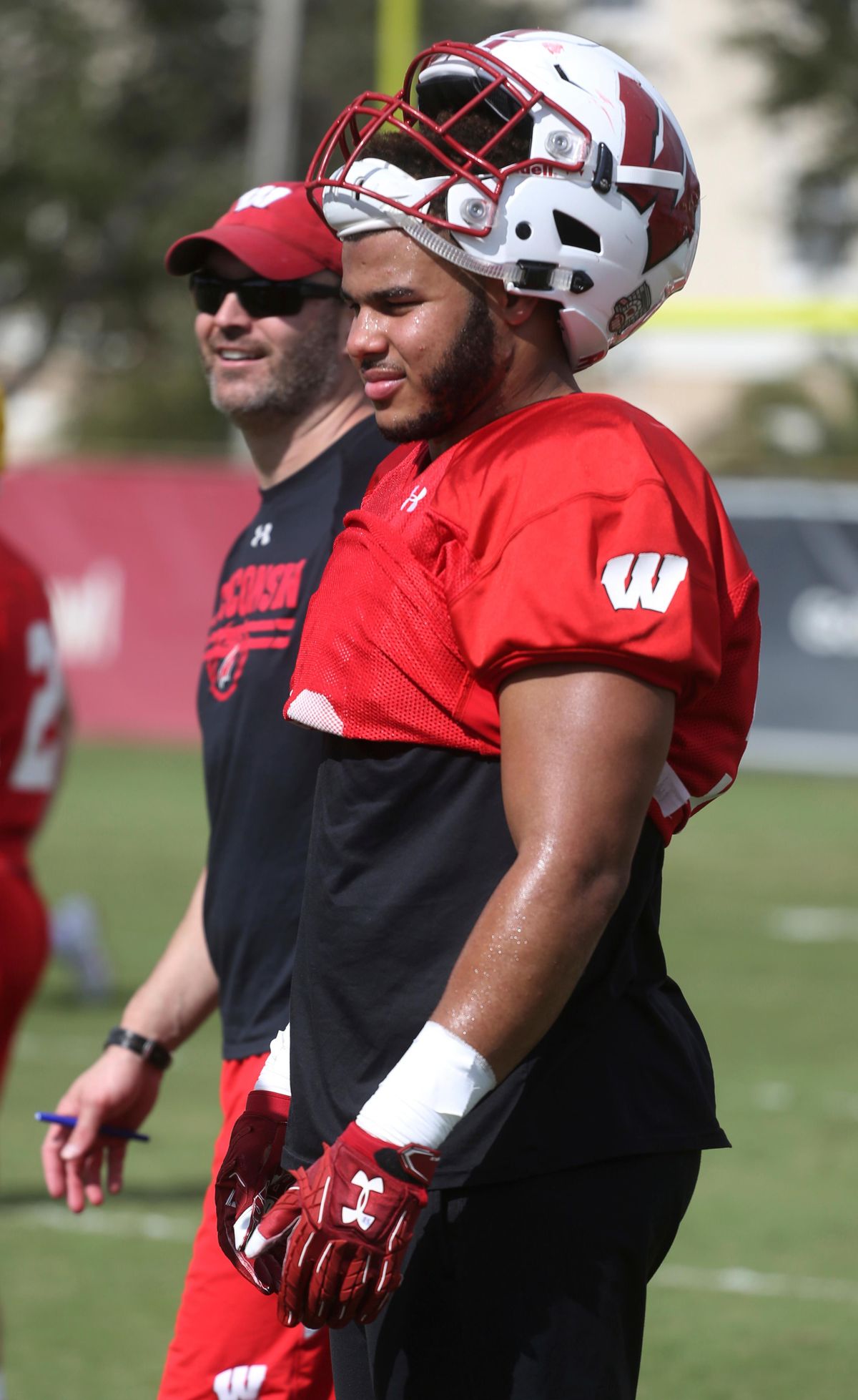 In this Dec. 30, 2017 file photo, Wisconsin linebacker T.J. Edwards (53) takes a break from practice in Miami Shores, Fla. Wisconsin is retooling at outside linebacker this spring, when coach Paul Chryst will start evaluating potential replacements for the productive Garret Dooley and Leon Jacobs. Andrew Van Ginkel seems set to fill one starting spot. The Badgers though are set at inside linebacker, where All-American T.J. Edwards is back to lead a strong group. (Marta Lavandier / Associated Press)