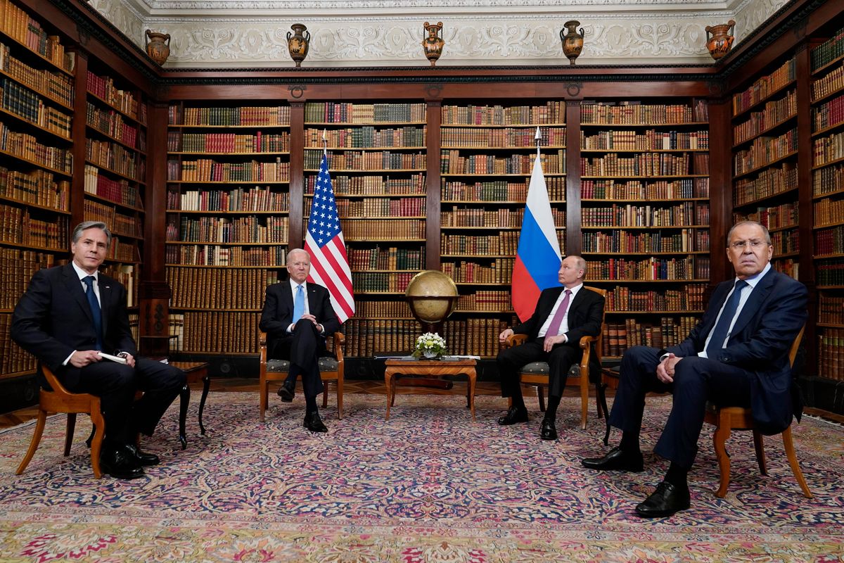 FILE - U.S. President Joe Biden and Secretary of State Antony Blinken, left, meets with Russian President Vladimir Putin and Foreign Minister Sergey Lavrov, at the 