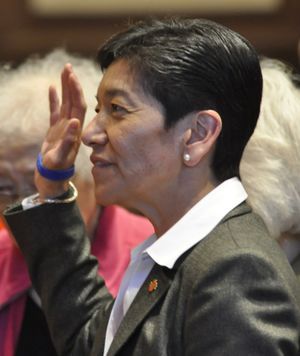 OLYMPIA -- King County Superior Court Judge Mary Yu takes the oath of office Tuesday as a member of the state Supreme Court.  (Jim Camden)