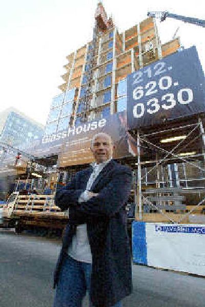 
Abram Shnay poses in front of The Urban Glass house at 330 Spring St. still under construction in New York.
 (Associated Press / The Spokesman-Review)