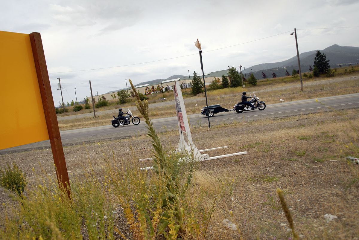 Developers are proposing a $25.2 million resort on vacant land along the Spokane River near Cabela’s in Post Falls.  (Brian Plonka / The Spokesman-Review)