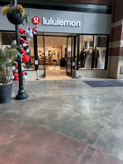 Balloons adorn the outside of lululemon, the athletic store, which recently moved from the Crescent Building into the first floor of River Square Park.  (Courtesy)