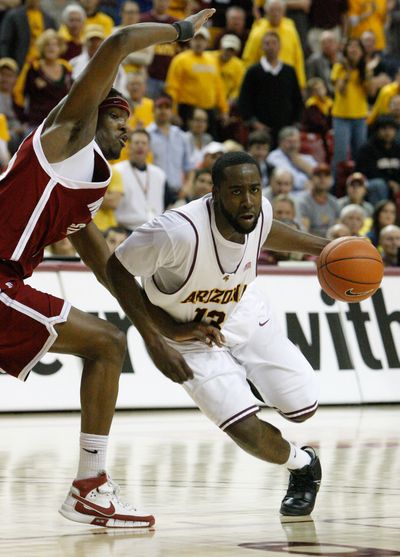 Arizona State's James Harden, right, drives around Washington State's DeAngelo Casto, left, during the second half. Washington State beat No. 14 Arizona State 65-55.  (Aaron Latham / The Spokesman-Review)