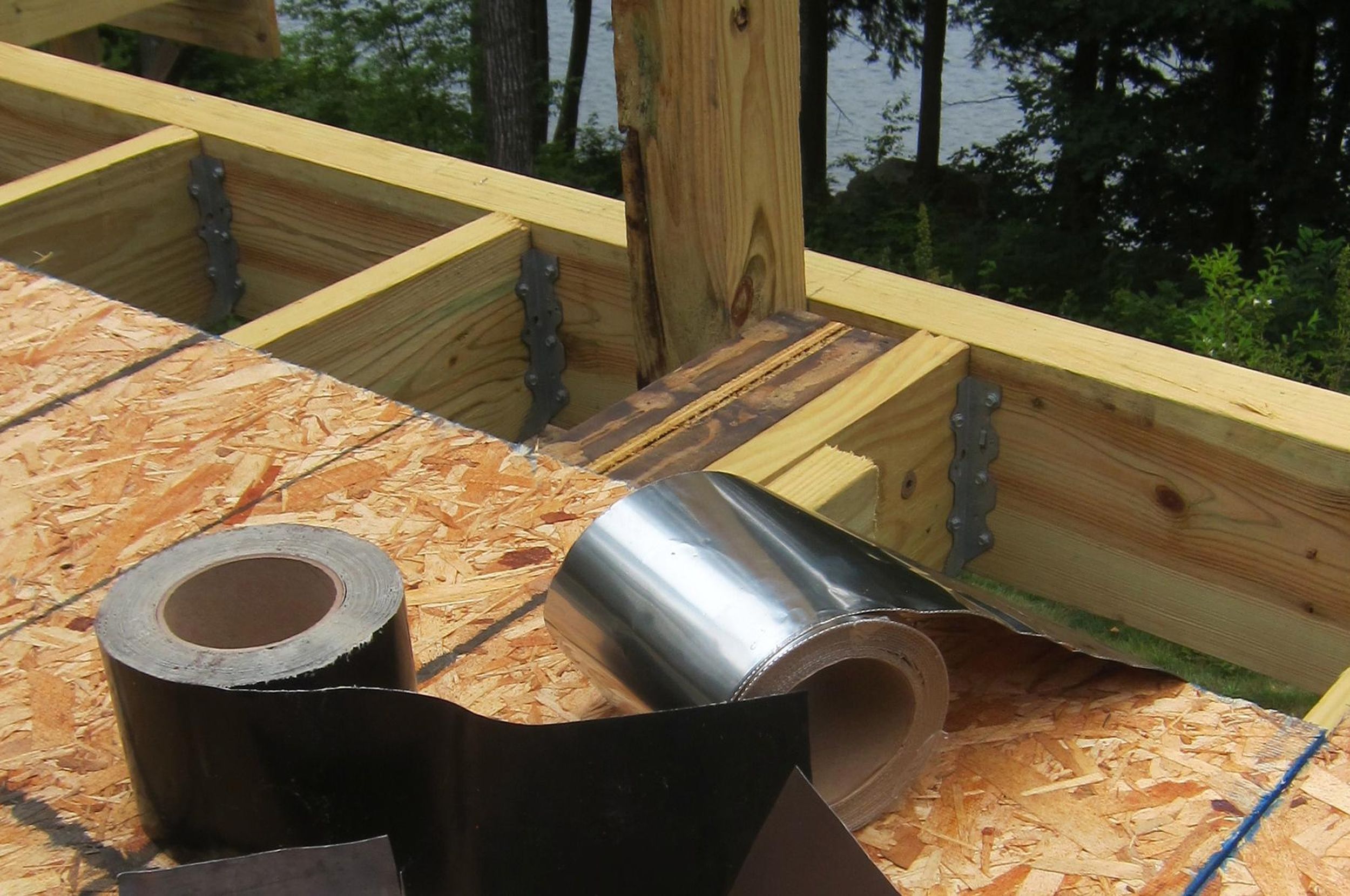Don’t mistake caulk for an acceptable deck flashing material The