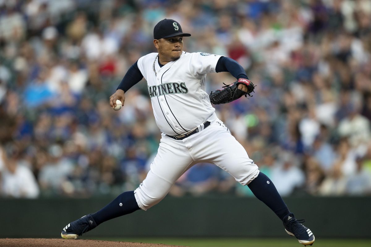 Seattle Mariners starter Erasmo Ramirez delivers a pitch during the first inning  against the Los Angeles Dodgers on Saturday in Seattle. (Stephen Brashear / AP)