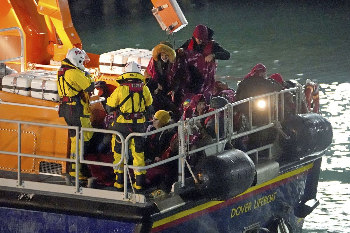 A group of people thought to be migrants are brought in to Dover, England by the RNLI, following a small boat incident in the English Channel, Thursday Nov. 25, 2021. On Wednesday around 30 migrants bound for Britain died when their boat sank in the English Channel, in what France’s interior minister called the biggest migration tragedy on the dangerous crossing to date.  (Gareth Fuller)