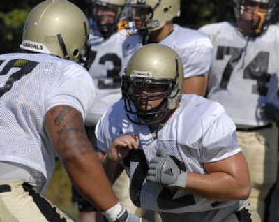 
Idaho center Adam Korby, right, likes the Vandals' progress. 
 (Dan Pelle / The Spokesman-Review)