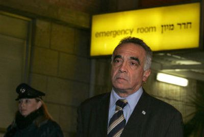 
Raanan Gisin, senior adviser to Israeli Prime Minister Ariel Sharon, speaks to journalists outside the emergency room of the Hadassah hospital in Jerusalem early today after Sharon's stroke. 
 (Associated Press / The Spokesman-Review)