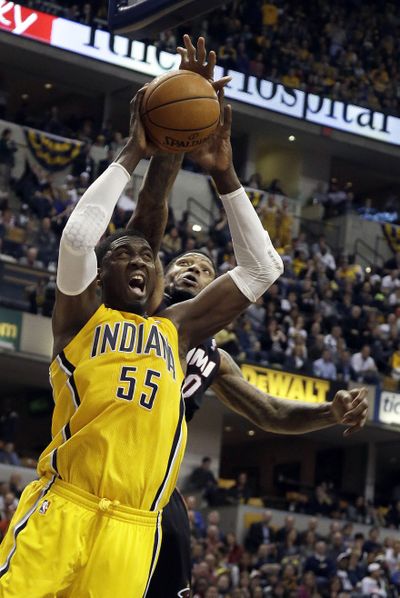 Indiana Pacers center Roy Hibbert shoots in front of Miami Heat forward Udonis Haslem during the second half. (Associated Press)