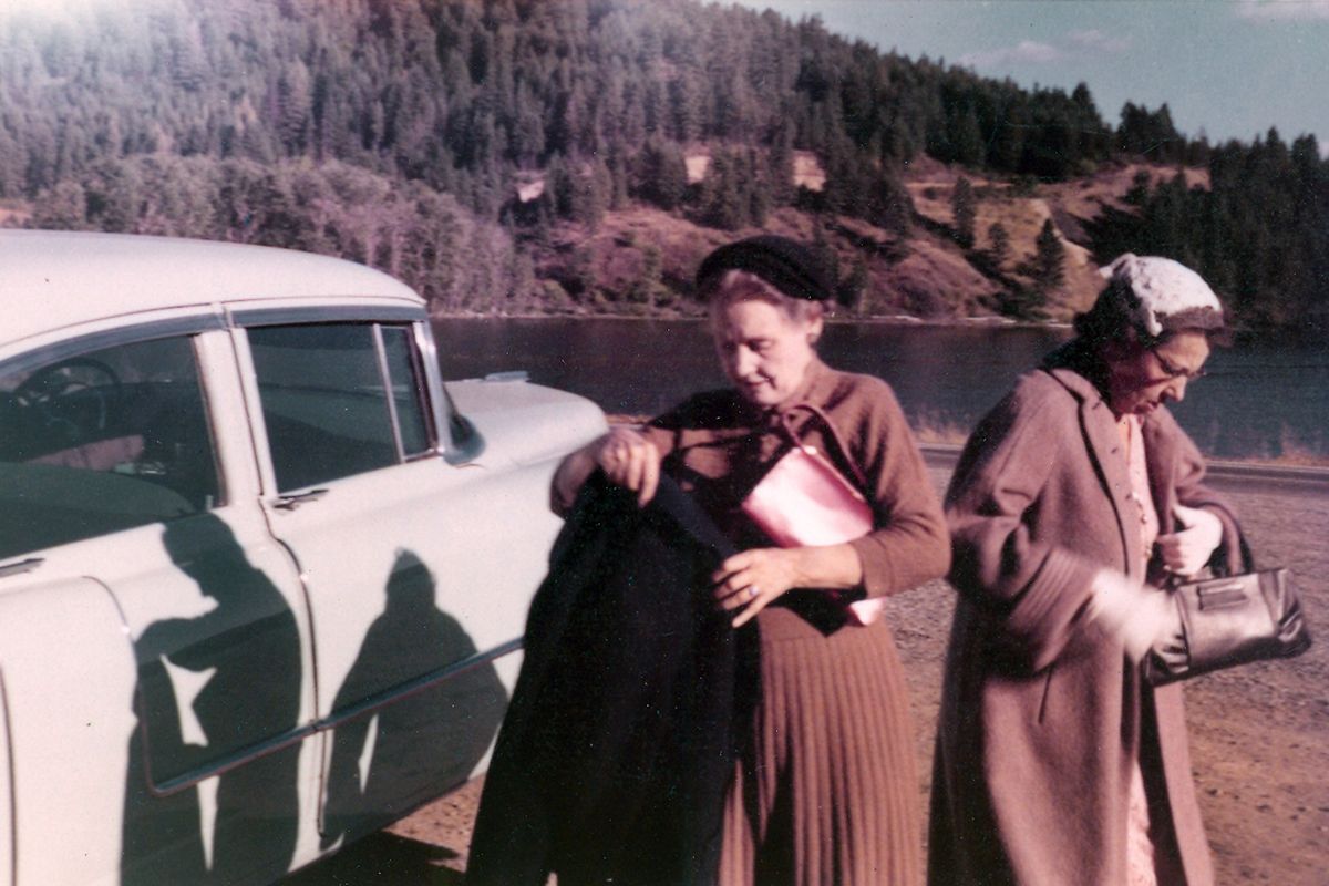 Keo King LaVell and an unidentified friend visit an Inland Northwest lake in October 1955.