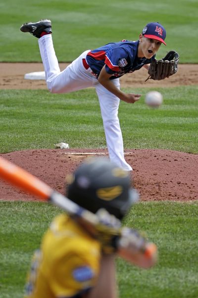 New York pitcher Michael Mancini delivers against Tennessee in United States pool play at the Little League World Series. (Gene J. Puskar / Associated Press)