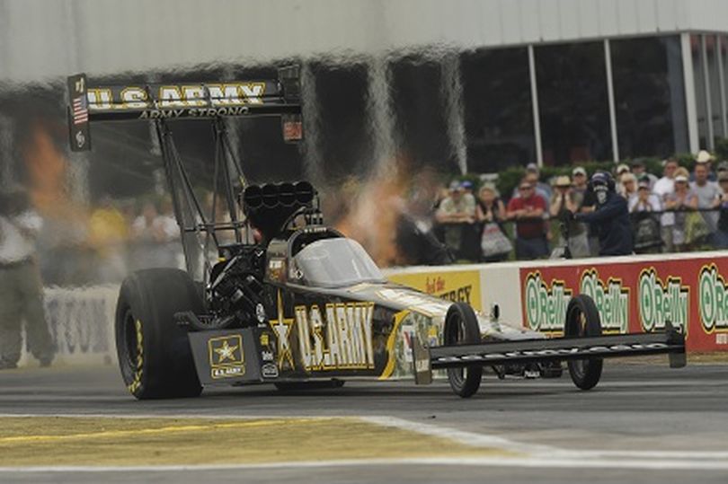 Tony Schumacher blazes to the top qualifying spot in Houston. (Photo courtesy of NHRA)