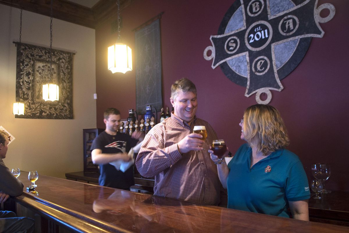 Jeff and Dana Whitman talk about their new styles of beer at Selkirk Abbey in Post Falls on Monday, November 21, 2016. (Kathy Plonka / The Spokesman-Review)