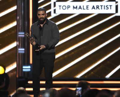 Drake accepts the award for top male artist at the Billboard Music Awards at the T-Mobile Arena on Sunday, May 21, 2017, in Las Vegas. (Chris Pizzello / Invision via Associated Press)