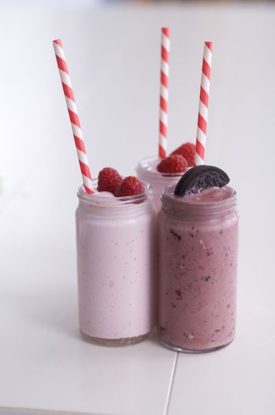 A chocolate cherry buttermilk shake, right, and raspberry key lime cheesecake milkshake are shown. (Associated Press)