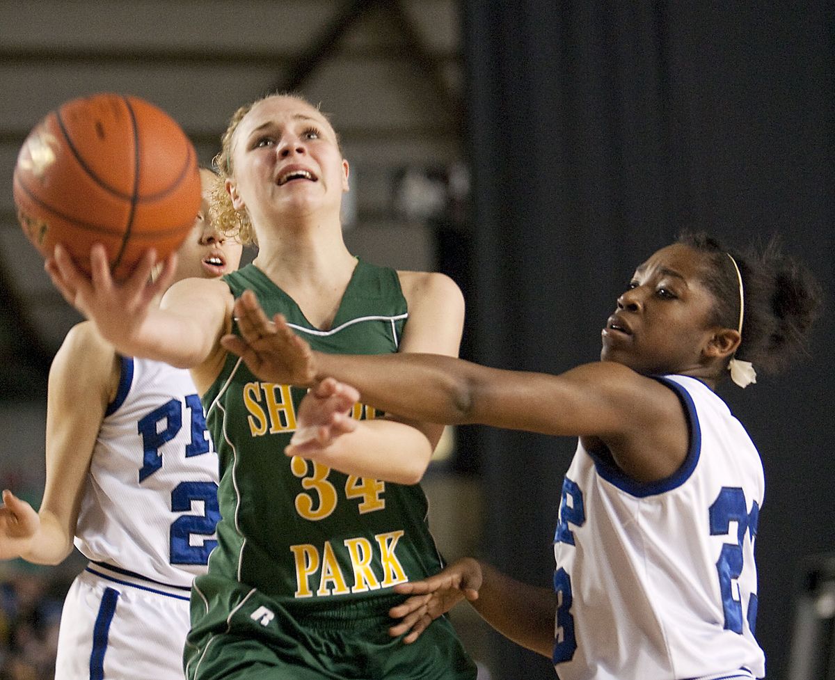 Aleisha Hathaway is fouled by Seattle Prep’s Brittany McMillan. Special to The S-R (Patrick Hagerty Special to The S-R)