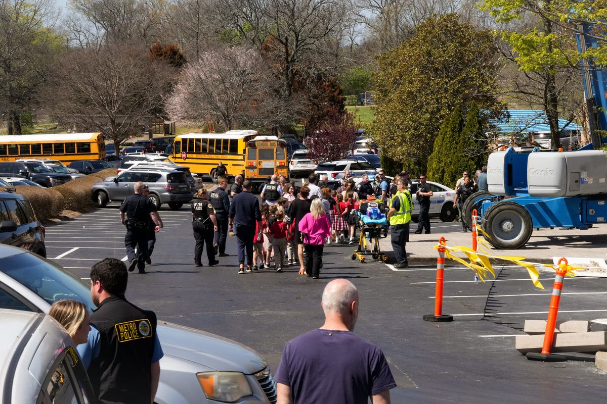 Parents and children reunite after the mass shooting at the Covenant School, in which three children and three adults were killed, in Nashville, Tenn., March 27. The lack of information about what motivated the deadly attack on the Christian school has led to a protracted legal fight over releasing the shooter