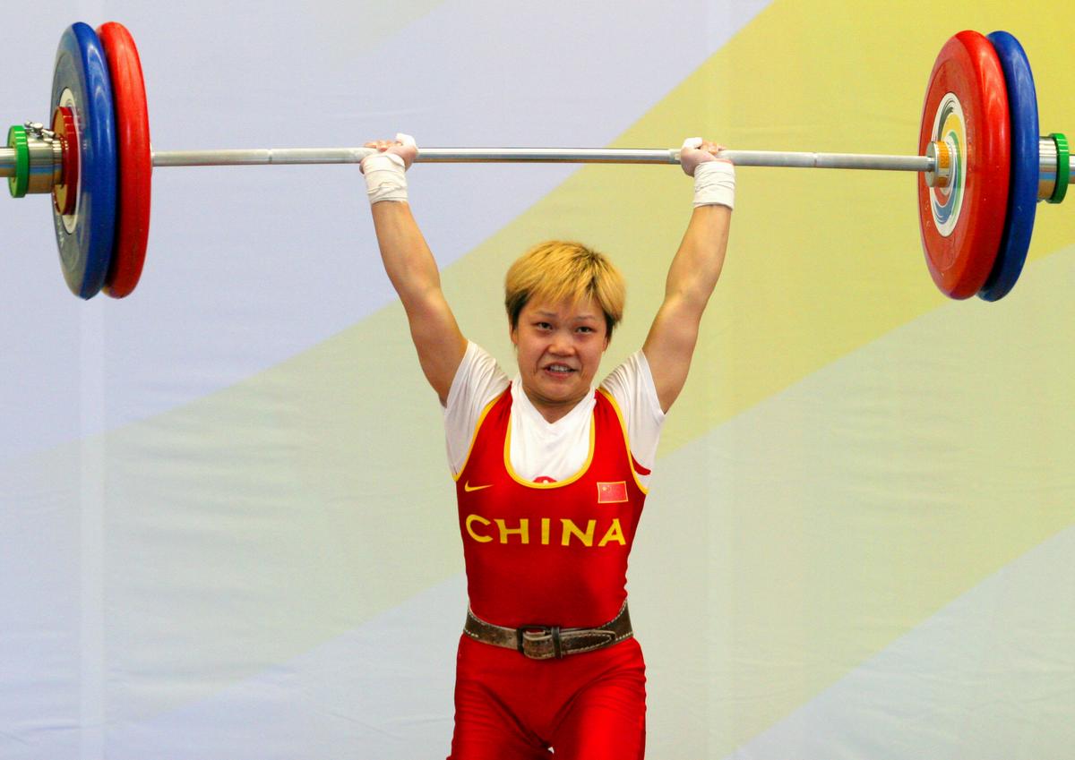 Yang Lian said glory will come to China’s first gold-medal winner.  (Associated Press / The Spokesman-Review)
