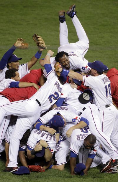 Vladimir Guerrero is on top of the heap and the Rangers atop the A.L. (Associated Press)