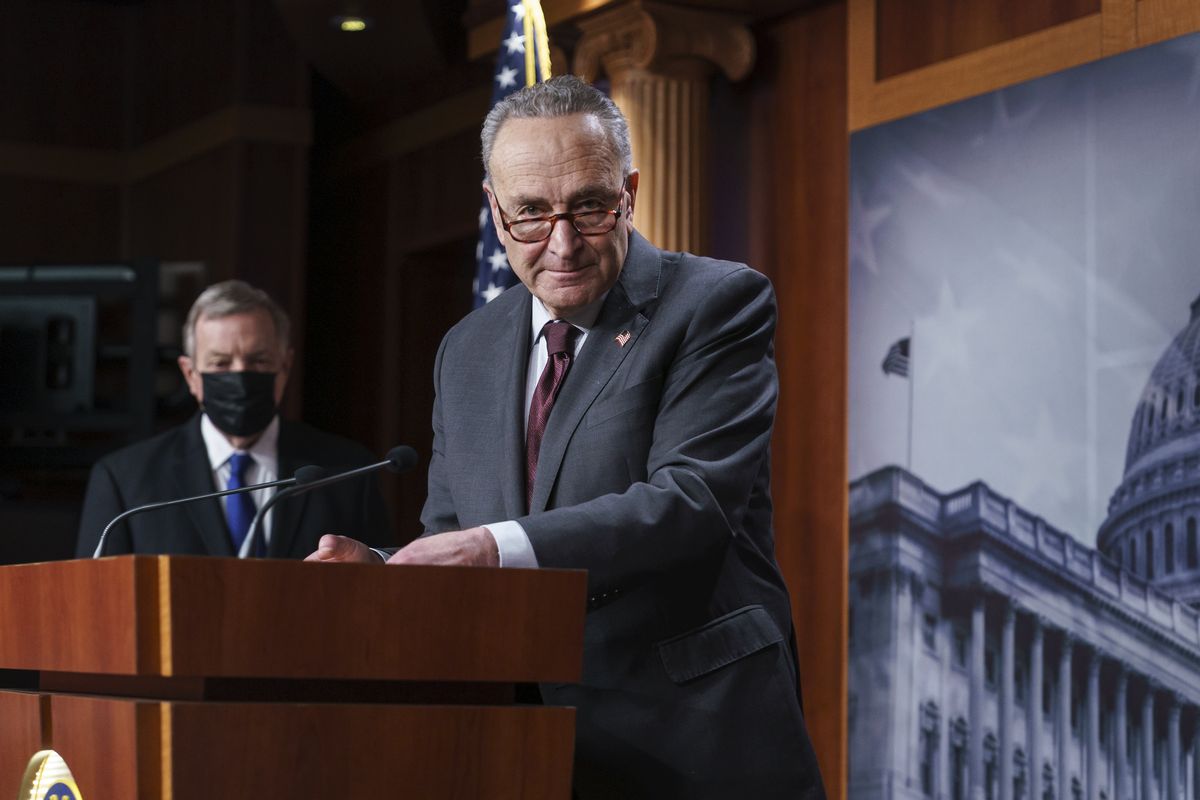 Senate Majority Leader Chuck Schumer, D-N.Y., joined at left by Sen. Dick Durbin, D-Ill., the majority whip, speaks at a news conference at the Capitol in Washington, Tuesday, Feb. 2, 2021.  (J. Scott Applewhite)