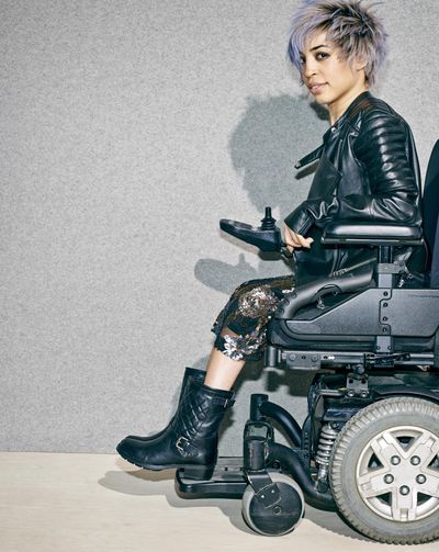 This photo provided by Nordstrom shows a model in a wheelchair advertising boots in the company’s annual July anniversary catalog. Nordstrom has been using professional models with disabilities in ads and catalogs since 1997. (Associated Press)
