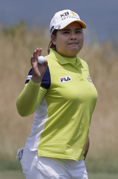 Inbee Park acknowledges the crowd after sinking a putt on the ninth hole during the first round at the U.S. Women's Open. (Associated Press)