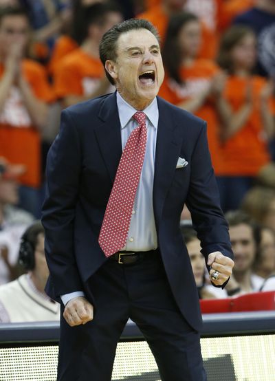 Head men’s basketball coach Rick Pitino is looking for answers to scandal that rocked his Louisville Cardinals program. (Associated Press)