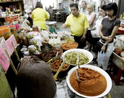 In this AP file photo, a Thai cooking instructor leads his foreign students tour the Bangkok market prior to a cooking class in Bangkok, Thailand. With its blend of salty, sweet, sour and spice, Thai food is a sophisticated cuisine that pleases even the most discerning palates. (AP file photo)