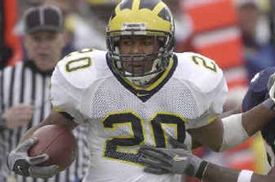 
Michigan's Michael Hart 
 (The Spokesman-Review)