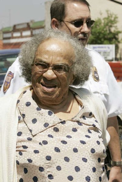 
Fannie Lee Chaney, mother of murdered civil-rights worker James Chaney, is escorted from the Neshoba County Court House  on Saturday in Philadelphia, Miss. Chaney testified in the trial of Edgar Ray Killen. 
 (Associated Press / The Spokesman-Review)