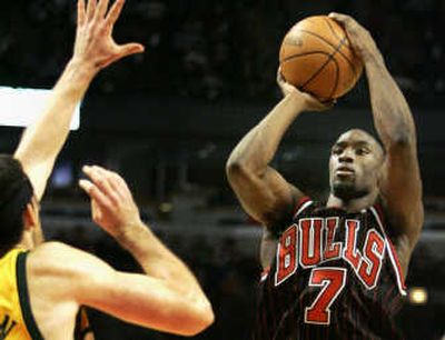 
Bulls guard Ben Gordon, who scored 27 points, shoots over Seattle's Nick Collison during the first half Tuesday.Associated Press
 (Associated Press / The Spokesman-Review)