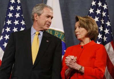 
President Bush has a word with House Speaker Nancy Pelosi of Calif.  in Washington on Wednesday, prior to signing the Energy Independence and Security Act of 2007. Associated Press
 (Associated Press / The Spokesman-Review)