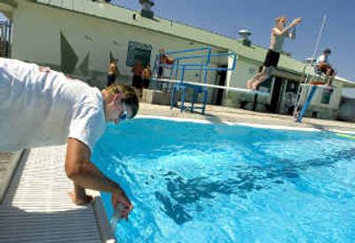
At the Park Road swimming pool, lifeguard T.J. Hanson, tests the pH and chlorine levels every two hours. At the Park Road swimming pool, lifeguard T.J. Hanson, tests the pH and chlorine levels every two hours. 
 (Colin Mulvany / The Spokesman-Review)