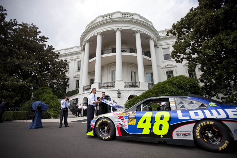 President Barack Obama looks under the hood of the No. 48 Lowe's Chevrolet with three-time defending NASCAR Sprint Cup Series champion Jimmie Johnson at the White House in Washington, D.C. on Wednesday. (Photo Credit: Official White House Photo by Chuck Kennedy) (Chuck Kennedy / The Spokesman-Review)