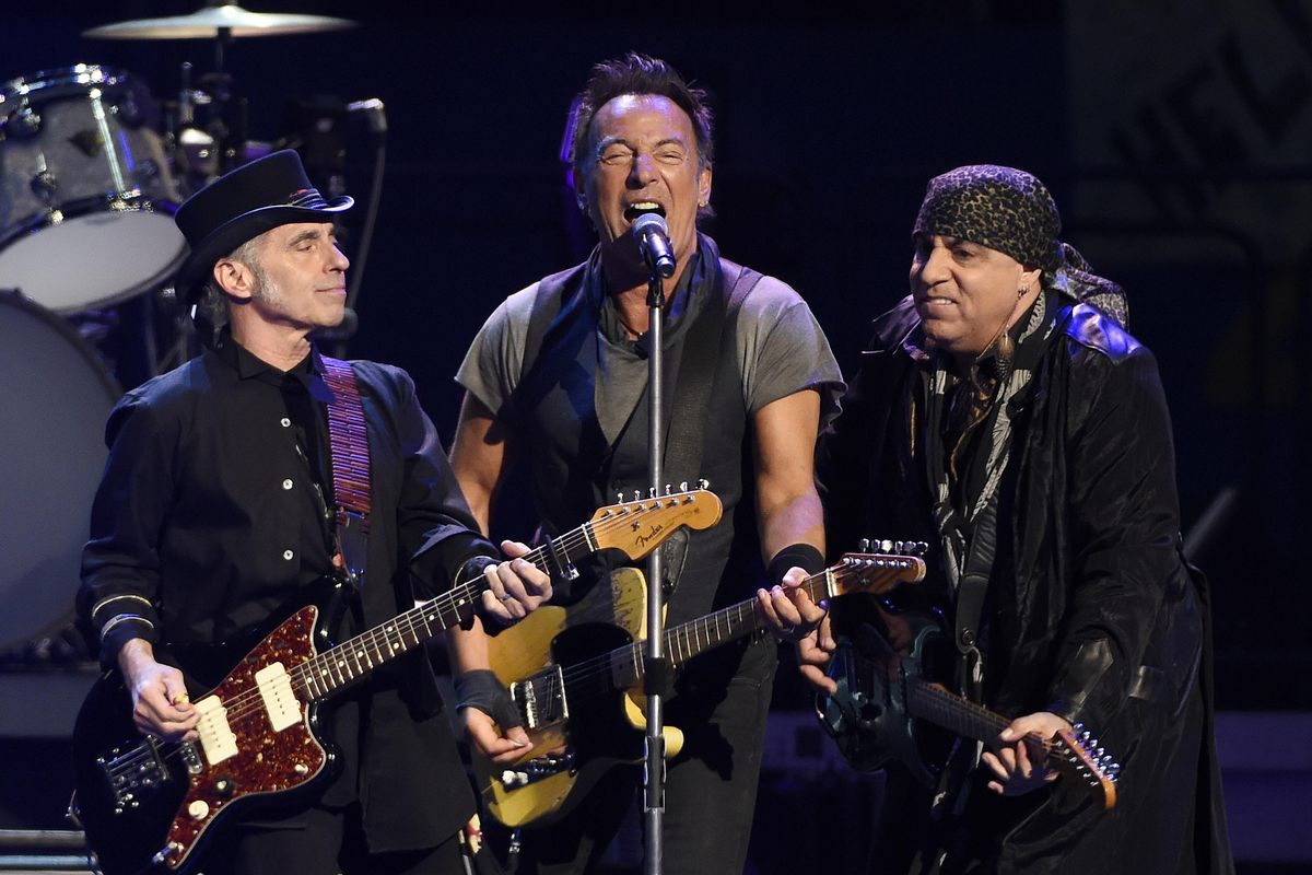 In this Tuesday, March 15, 2016 file photo, Bruce Springsteen, center, performs with Nils Lofgren, left, and Steven Van Zandt of the E Street Band during their concert at the Los Angeles Sports Arena in Los Angeles. Fourth-grader Xabi Glovsky and his father, Scott, attended the sold-out show, and they caught Springsteen